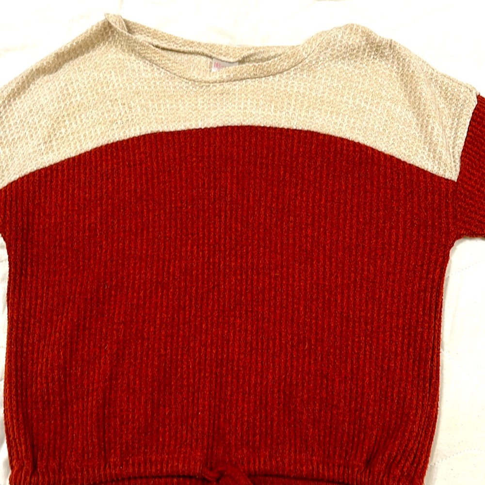 Red long sleeve with tie.